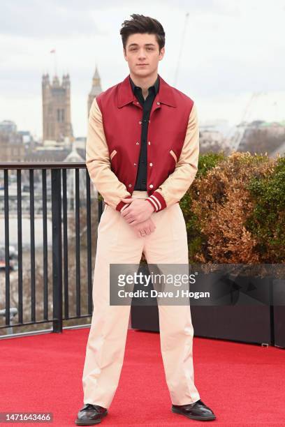 Asher Angel attends the “Shazam! Fury of the Gods" photocall at Savoy Place on March 06, 2023 in London, England.