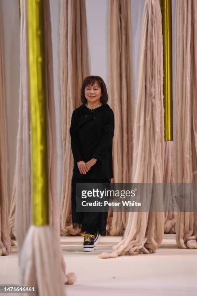 Designer Wang Chen Tsai-Hsia acknowledges the audience during the Shiatzy Chen Womenswear Fall Winter 2023-2024 show as part of Paris Fashion Week on...
