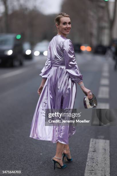 Marina von Lison seen wearing long purple RVNG couture dress, silver glitter Helena Joy Joaillerie jewelry, small colorful Emm Kuo bag, darkgreen...