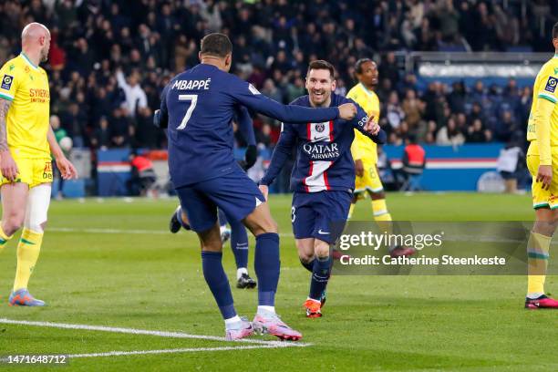 Lionel Messi of Paris Saint-Germain celebrates his goal with Kylian Mbappe of Paris Saint-Germain during the Ligue 1 match between Paris...