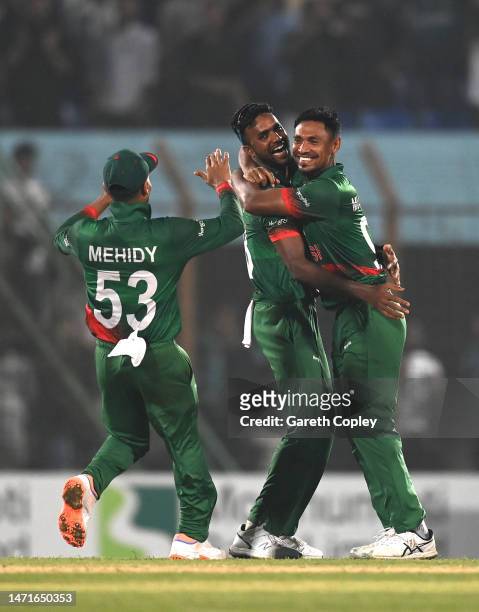 Bangladesh bowler Mustafizur Rahman celebrates with team mates after catching Chris Woakes off his own bowling to win the game during the 3rd ODI...