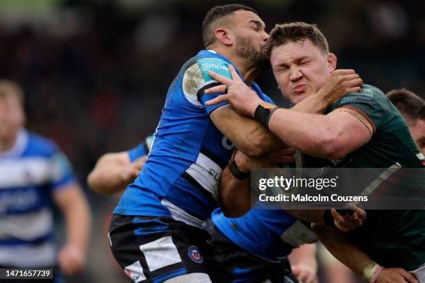 Jonathan Joseph of Bath Rugby tackles Jasper Wiese of Leicester Tigers during the Gallagher Premiership Rugby match between Leicester Tigers and Bath...