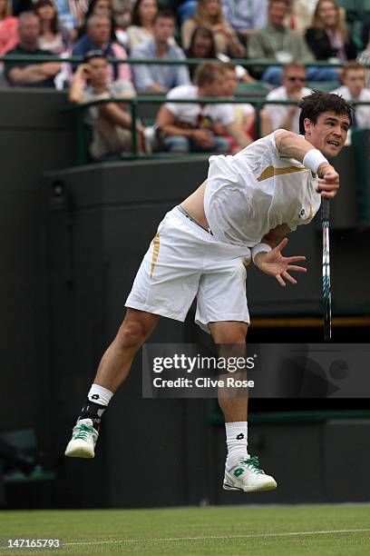 Jamie Baker of Great Britain in action during his Gentlemen's Singles first round match against Andy Roddick of the USA on day two of the Wimbledon...