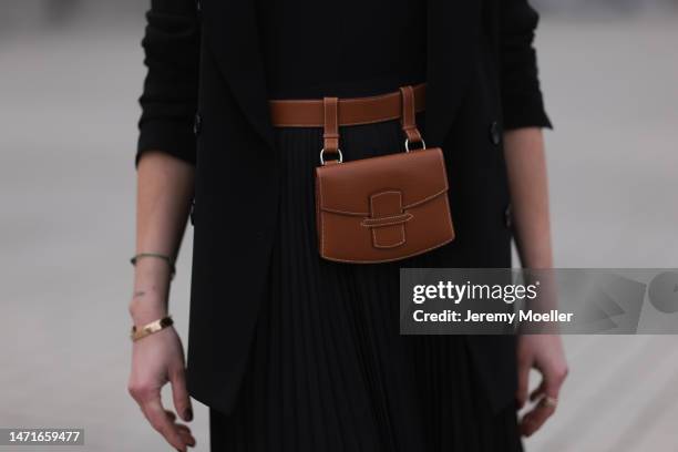Patricia Wirschke seen wearing Zara black button v-neck body, Max Mara black pleated long skirt, Tagliatore black blazer jacket, Hermès brown leather...