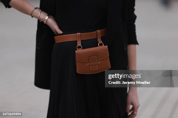 Patricia Wirschke seen wearing Zara black button v-neck body, Max Mara black pleated long skirt, Tagliatore black blazer jacket, Hermès brown leather...