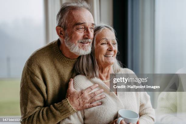 senior couple having romantic moment together. - senior-couple photos et images de collection
