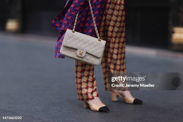 Patricia Wirschke seen wearing Odeeh purple / pink heart print pattern button maxi silk dress with long sleeves, Odeeh beige / red print pattern long...