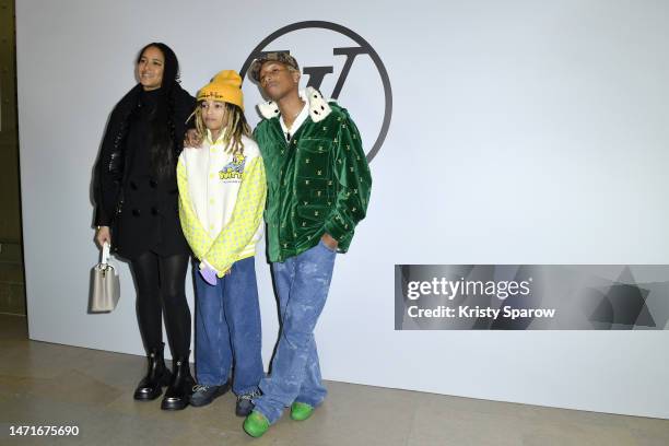 Helen Lasichanh, Rocket Ayer Williams and Pharrell Williams attends the Louis Vuitton Womenswear Fall Winter 2023-2024 show as part of Paris Fashion...