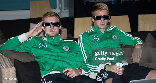 Members of the Germany national squad including Andre Schuerrle and Marco Reus relax during a special showing of the movie "The Amazing Spider-Man...