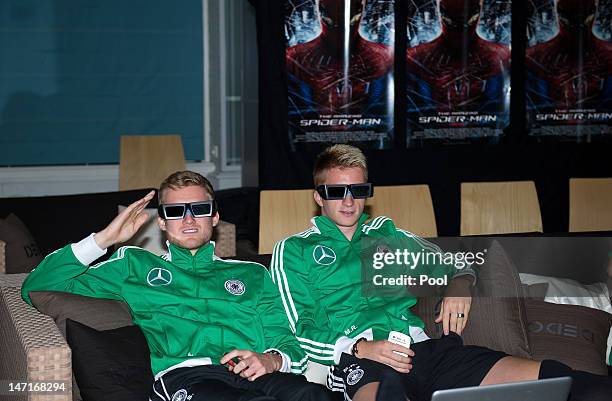 Members of the Germany national squad including Andre Schuerrle and Marco Reus relax during a special showing of the movie "The Amazing Spider-Man...