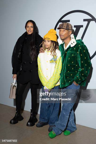Helen Lasichanh, Rocket Ayer Williams and Pharrell Williams attend the Louis Vuitton Womenswear Fall Winter 2023-2024 show as part of Paris Fashion...