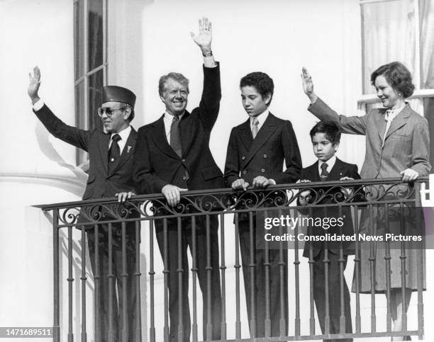 From left, Moroccan King Hassan II , US President Jimmy Carter, Mohammed VI, Prince Moulay Rachid, and US First Lady Rosalynn Carter as they wave and...