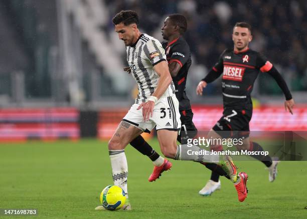 Maissa Ndiaye of Vicenza tussles with Emanuele Pecorino of Juventus breaks with the ball during the Serie C Coppa Italia Final First Leg match...