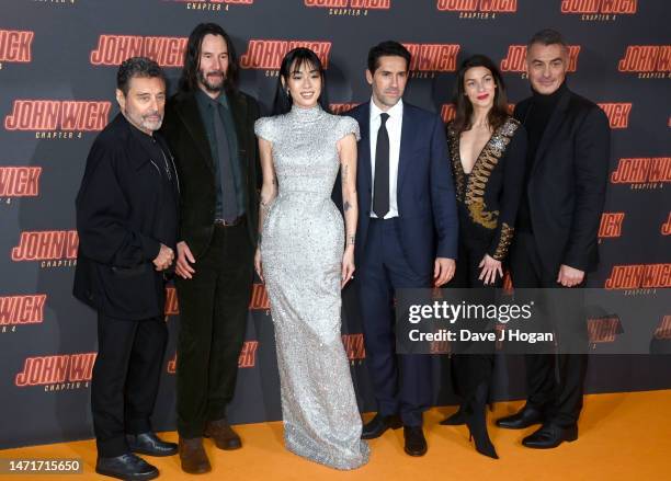 Ian McShane, Keanu Reeves, Rina Sawayama, Scott Adkin, Natalia Tena and Chad Stahelski arrive at the "John Wick: Chapter 4" UK Gala Screening at...