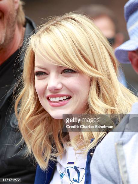 Actress Emma Stone attends the "Be Amazing" Stand Up Volunteer Initiative at Madison Boys And Girls Club on June 26, 2012 in the Brooklyn borough of...