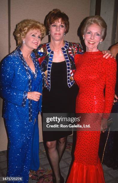 From left, American actors Debbie Reynolds, Carol Burnett, and Janet Leigh attend the 35th annual Thalians Ball at the Century Plaza Hotel, Century...