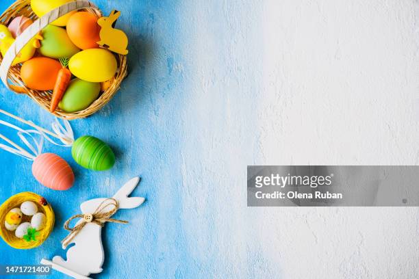 easter bunnies, eggs in a basket and a nest. - chicken decoration stock pictures, royalty-free photos & images