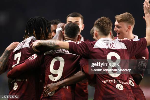 Yann Karamoh of Torino FC celebrates with team mates after scoring to give the side a 1-0 lead during the Serie A match between Torino FC and Bologna...