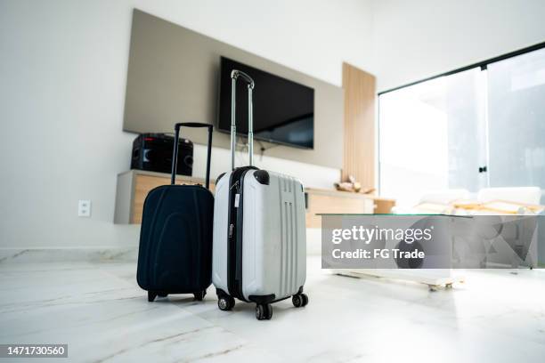 suitcases in the house - suitcase hotel stock pictures, royalty-free photos & images