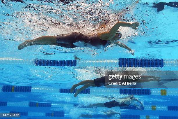 Rebecca Soni and Amanda Beardcompete in preliminary heat 16 of the Women's 100 m Breaststroke during Day Two of the 2012 U.S. Olympic Swimming Team...