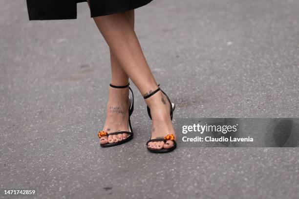 Guest, fashion details, is seen outside Lanvin, during Paris Fashion Week - Womenswear Fall Winter 2023 2024, on March 05, 2023 in Paris, France.