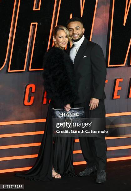 Aston Merrygold and Sarah Richards attending the "John Wick: Chapter 4" UK Gala Screening at Cineworld Leicester Square on March 06, 2023 in London,...