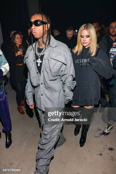 Tyga and Avril Lavigne attend the Mugler x Hunter Schafer party as part of Paris Fashion Week at Pavillon des Invalides on March 06, 2023 in Paris,...