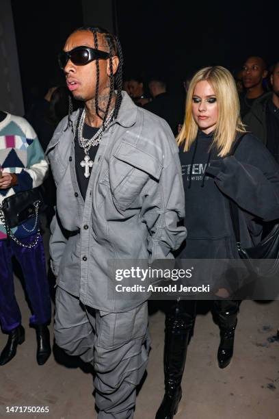 Tyga and Avril Lavigne attend the Mugler x Hunter Schafer party as part of Paris Fashion Week at Pavillon des Invalides on March 06, 2023 in Paris,...