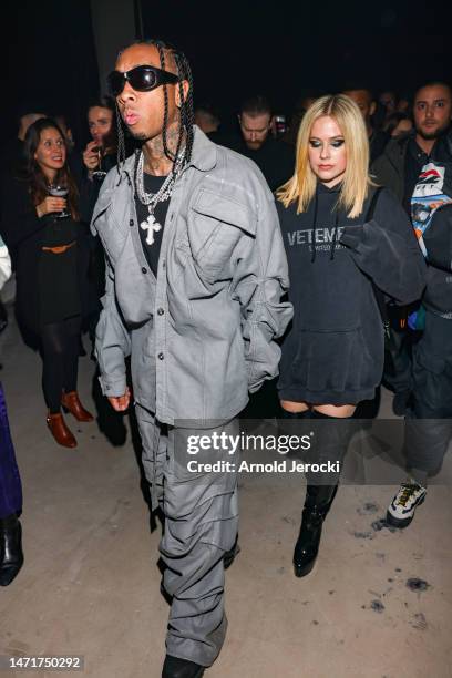 Tyga and Avril Lavigne attend the Mugler x Hunter Schafer party as part of Paris Fashion Week at Pavillon des Invalides on March 06, 2023 in Paris,...