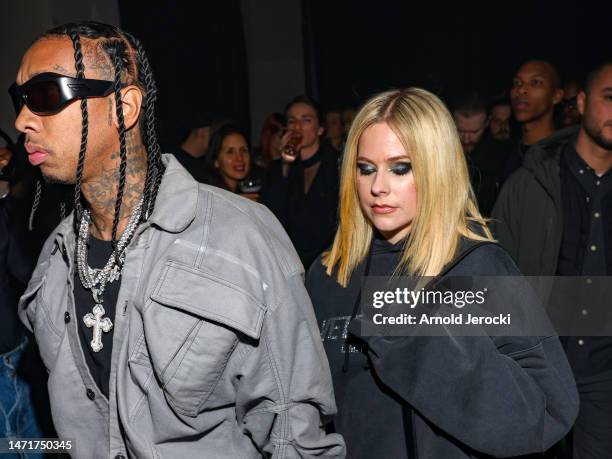 Tyga and Avril Lavigne attend the Mugler x Hunter Schafer party as part of Paris Fashion Week at Pavillon des Invalides on March 06, 2023 in Paris,...