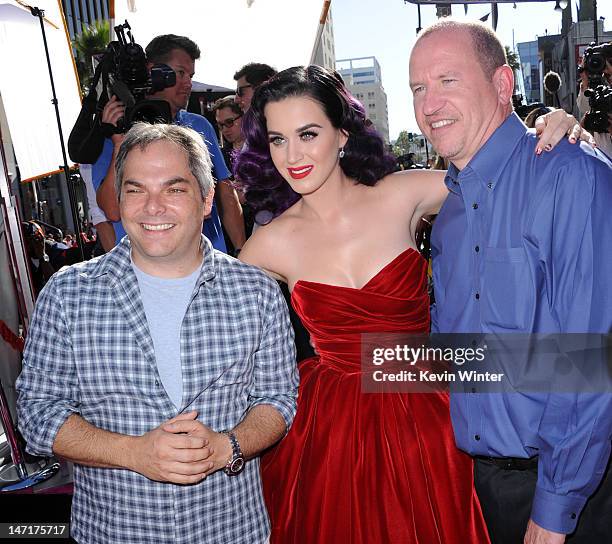 President, Paramount Film Group Adam Goodman, singer/producer Katy Perry, and Vice Chairman Paramount Pictures Rob Moore arrive at the premiere of...