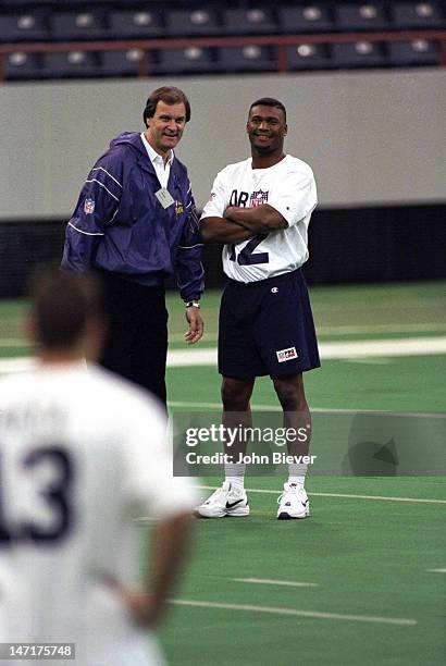 Scouting Combine: Former Alcorn State QB Steve McNair with Minnesota Vikings assistant coach Brian Billick at RCA Dome. Indianapolis, IN 2/11/1995...
