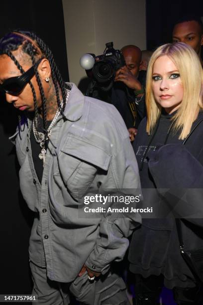 Tyga and Avril Lavigne attend the Mugler x Hunter Schafer party as part of Paris Fashion Week at Pavillon des Invalides on March 06, 2023 in Paris,...