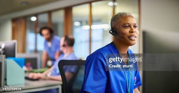 healthcare provider helpline - call centre stock pictures, royalty-free photos & images