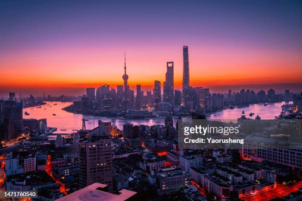colorful shanghai city in the morning,sunrise with clear sky - shanghai tower schanghai stock-fotos und bilder