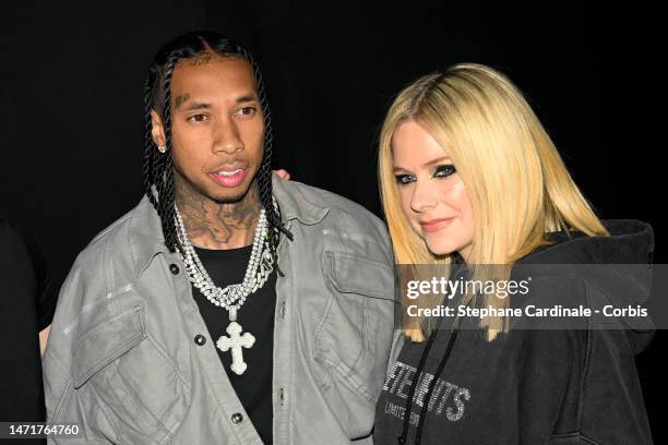 Tyga and Avril Lavigne attend the Mugler x Hunter Schafer party as part of Paris Fashion Week at Pavillon des Invalides on March 06, 2023 in Paris,...