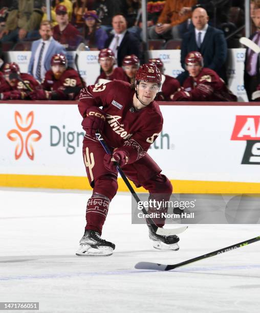 Matias Maccelli of the Arizona Coyotes passes the puck against the New Jersey Devils at Mullett Arena on March 05, 2023 in Tempe, Arizona.