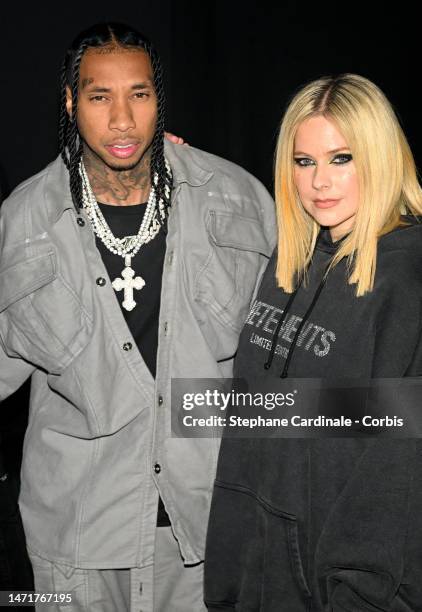 Tyga and Avril Lavigne attend the Mugler x Hunter Schafer party as part of Paris Fashion Week at Pavillon des Invalides on March 06, 2023 in Paris,...