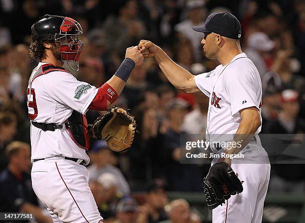 Jarrod Saltalamacchia of the Boston Red Sox and Alfredo Aceves celebrate their 5-1 win over Toronto Blue Jays at Fenway Park June 26, 2012 in Boston,...