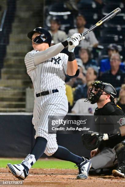 Aaron Judge of the New York Yankees hits a three-run home run in the second inning against the Pittsburgh Pirates during a Grapefruit League Spring...