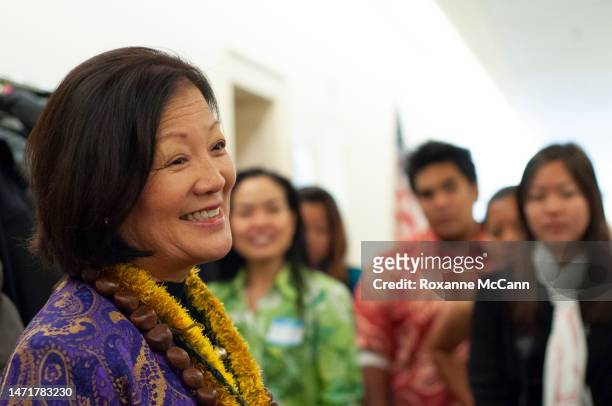 Rep.. Mazie Hirono wearing lei greets visitors to her office in January 2009 in Washington, D.C.