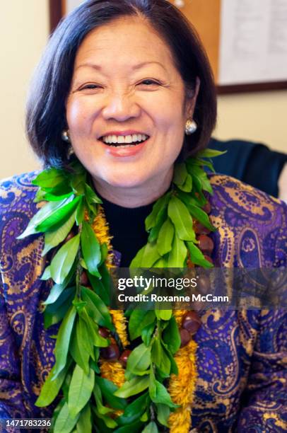 Rep. Mazie Hirono, wearing a maile lei greets visitors to her office in January 2009 in Washington, D.C.