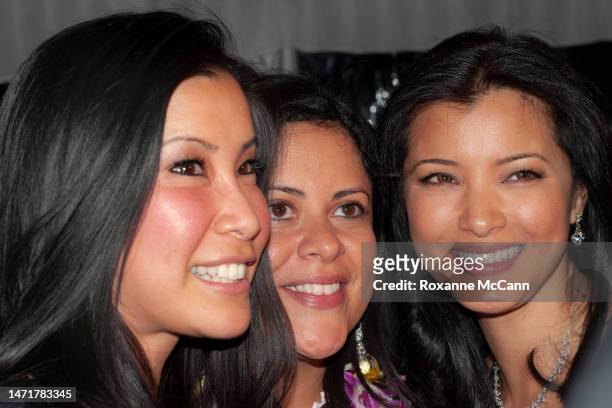 Supporter of Barack Obama journalist Lisa Ling, Maya Soetoro-Ng, sister of President-elect Barack Obama, and friend pose for a photograph at a party...