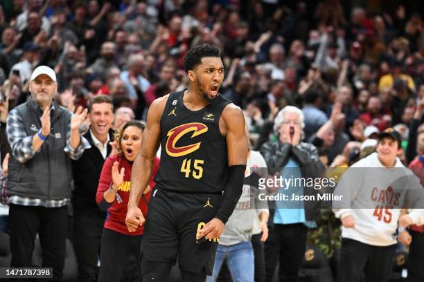 Donovan Mitchell of the Cleveland Cavaliers celebrates after the Cavaliers defeated the Boston Celtics in overtime at Rocket Mortgage Fieldhouse on...