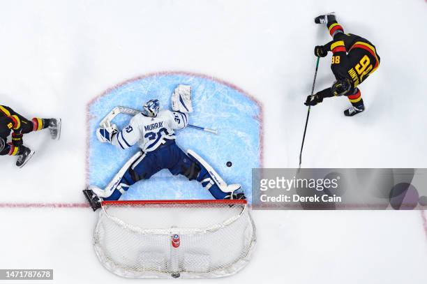 Matt Murray of the Toronto Maple Leafs makes a save on Christian Wolanin of the Vancouver Canucks during the second period of their NHL game at...