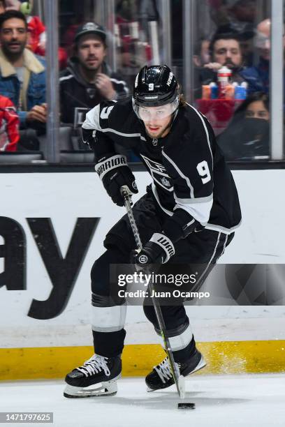 Adrian Kempe of the Los Angeles Kings skates with the puck during the first period against the Washington Capitals at Crypto.com Arena on March 6,...