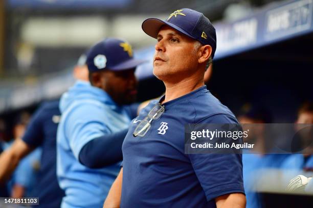Manager Kevin Cash of the Tampa Bay Rays looks on during a Grapefruit League Spring Training game against the Miami Marlins at Tropicana Field on...