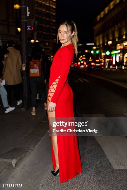 Olivia Ponton wears red cut out dress outside Dundas during Paris Fashion Week - Womenswear Fall Winter 2023 2024 : Day Eight on March 06, 2023 in...