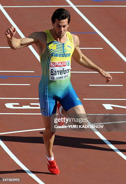 Sweden's Bjorn Barrefors wins the men's decathlon 100m heat 1 of the 2012 European Athletics Championships at the Olympic Stadium in Helsinki on June...