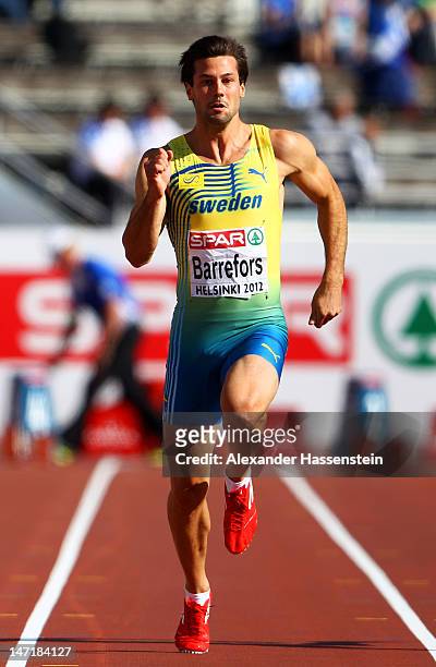 Bjorn Barrefors of Sweden competes in the 100 Metres during the Men's Decathlon during day one of the 21st European Athletics Championships at the...